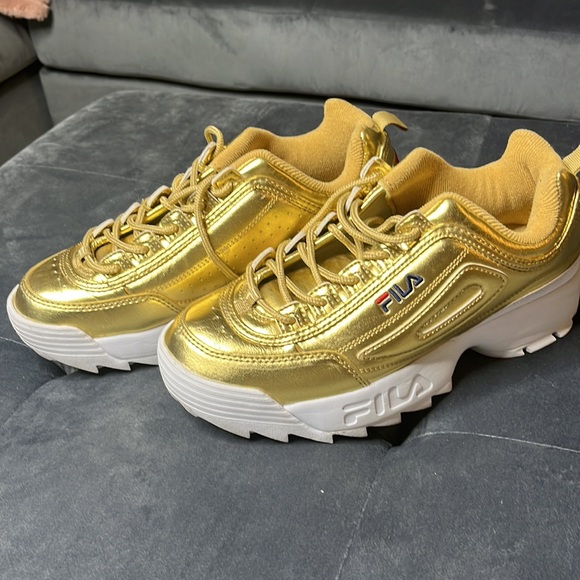 Metallic gold Filas with white trim - Picture 2 of 3